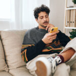 A man using text message therapy for grief