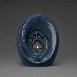 Pulvis art blue pet paw urn for ashes image.