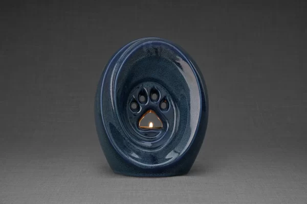 Pulvis art blue pet paw urn for ashes image.