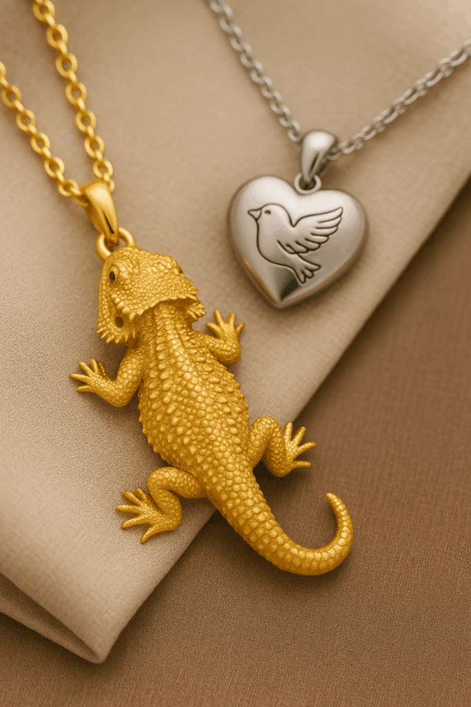Memorial jewelry with reptile and bird-themed designs, including a bearded dragon-inspired pendant.