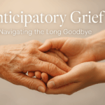 Two hands gently holding - representing anticipatory grief support during terminal illness caregiving