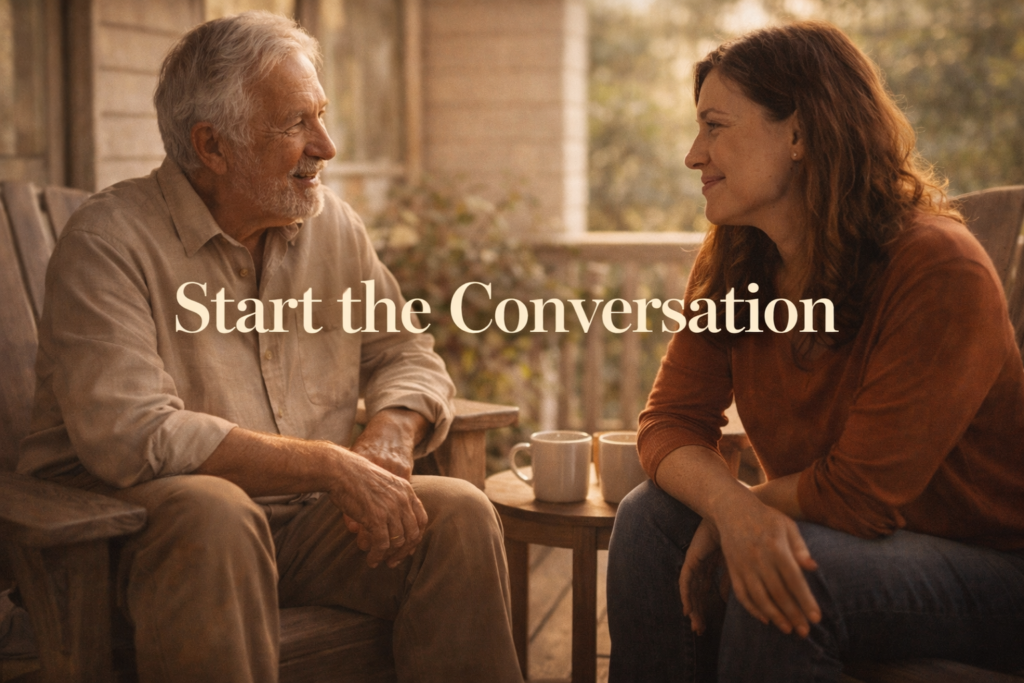  Father and adult daughter having a quiet legacy conversation together on a sunlit front porch with coffee mugs and soft morning light